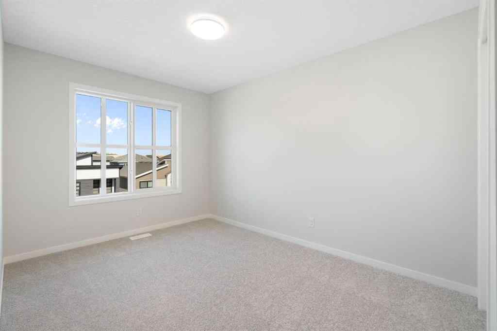 MLS® A2257737 - 34 Herron Common NE in Livingston Calgary, Residential