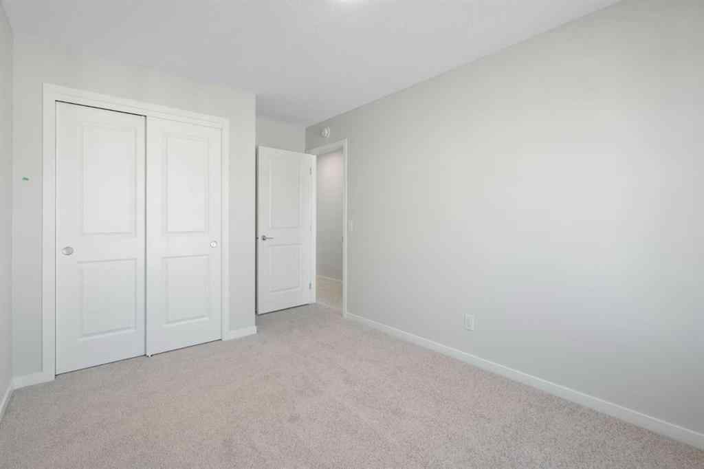 MLS® A2257737 - 34 Herron Common NE in Livingston Calgary, Residential