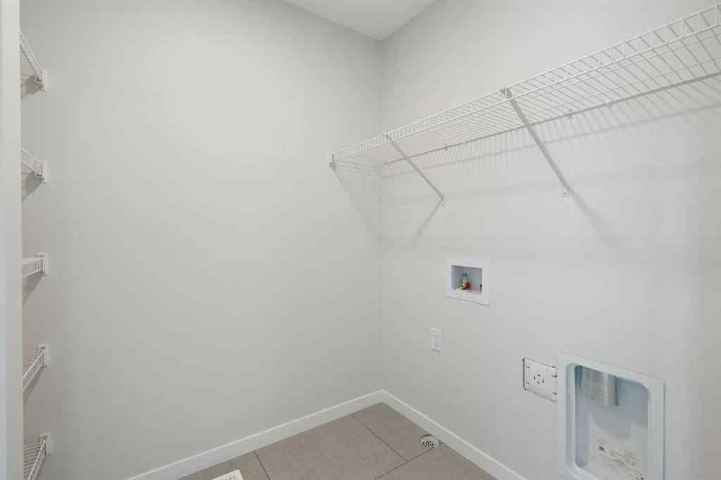 MLS® A2257737 - 34 Herron Common NE in Livingston Calgary, Residential