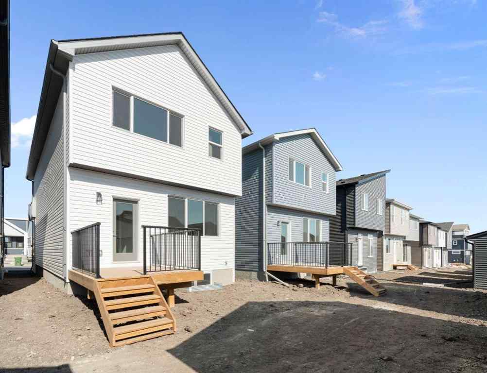 MLS® A2257737 - 34 Herron Common NE in Livingston Calgary, Residential