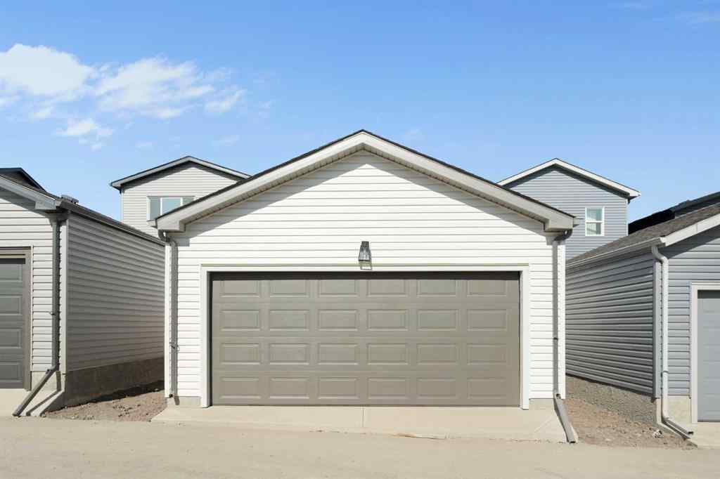 MLS® A2257737 - 34 Herron Common NE in Livingston Calgary, Residential