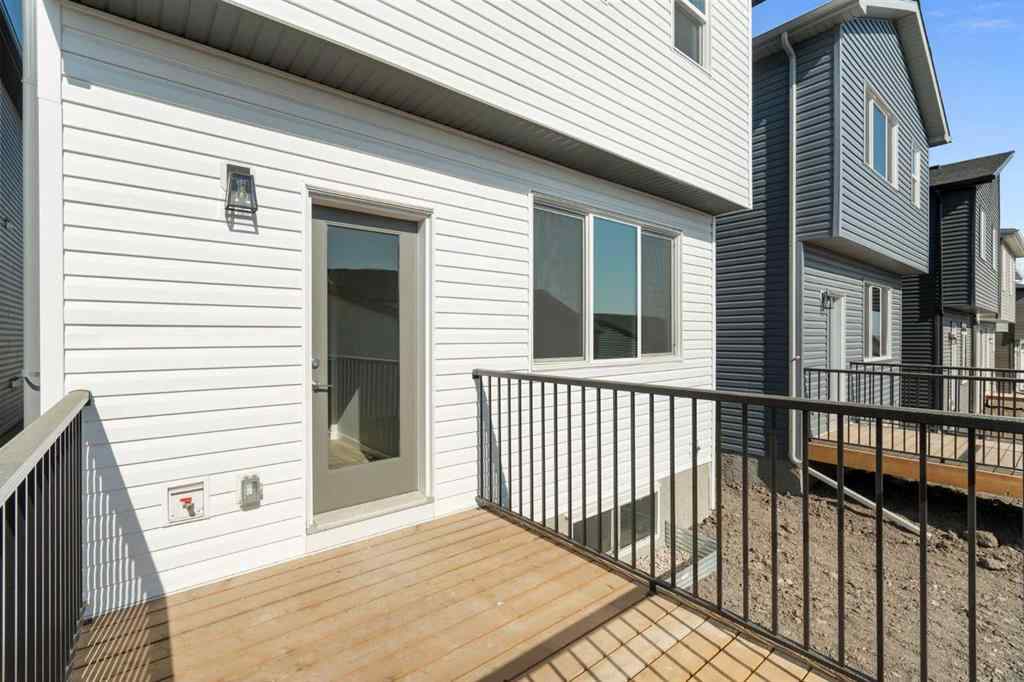 MLS® A2257737 - 34 Herron Common NE in Livingston Calgary, Residential