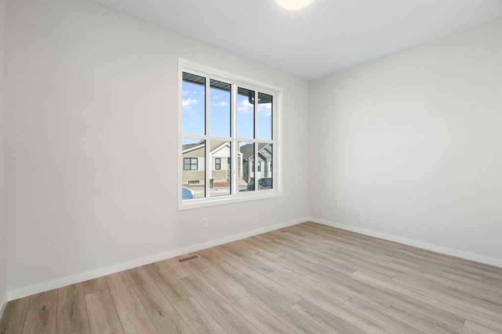MLS® A2257737 - 34 Herron Common NE in Livingston Calgary, Residential