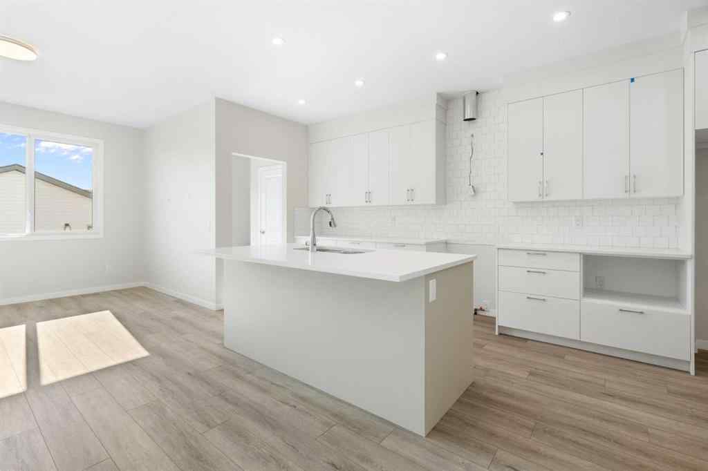 MLS® A2257737 - 34 Herron Common NE in Livingston Calgary, Residential