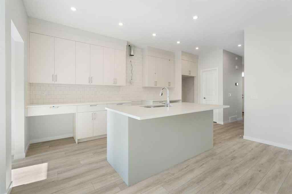 MLS® A2257737 - 34 Herron Common NE in Livingston Calgary, Residential
