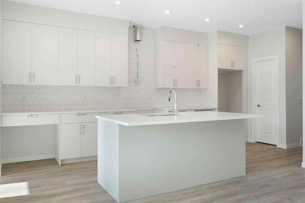 MLS® A2257737 - 34 Herron Common NE in Livingston Calgary, Residential