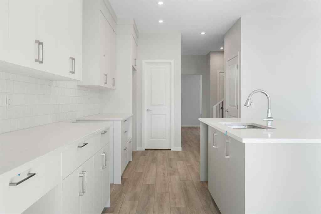 MLS® A2257737 - 34 Herron Common NE in Livingston Calgary, Residential