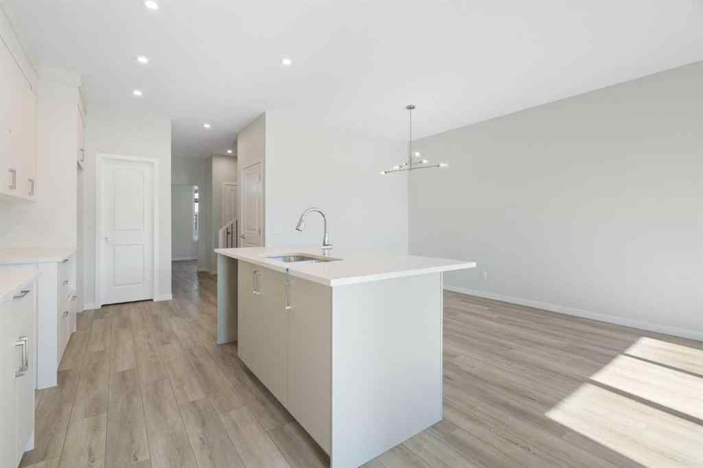 MLS® A2257737 - 34 Herron Common NE in Livingston Calgary, Residential