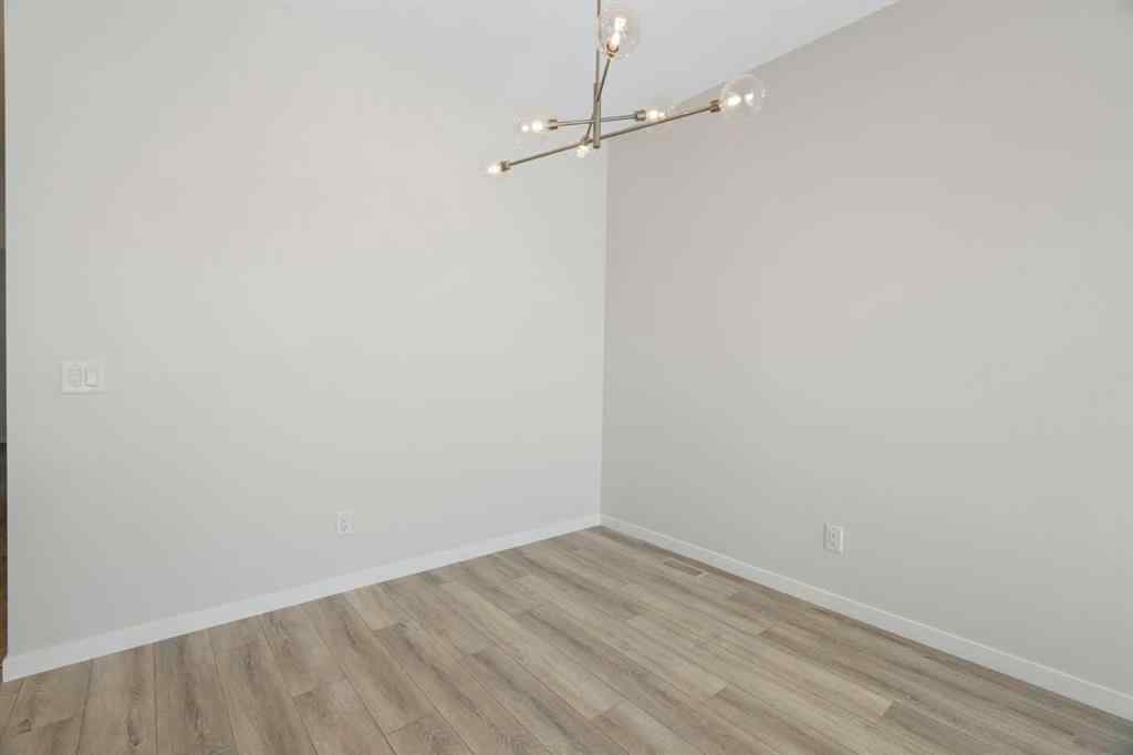 MLS® A2257737 - 34 Herron Common NE in Livingston Calgary, Residential