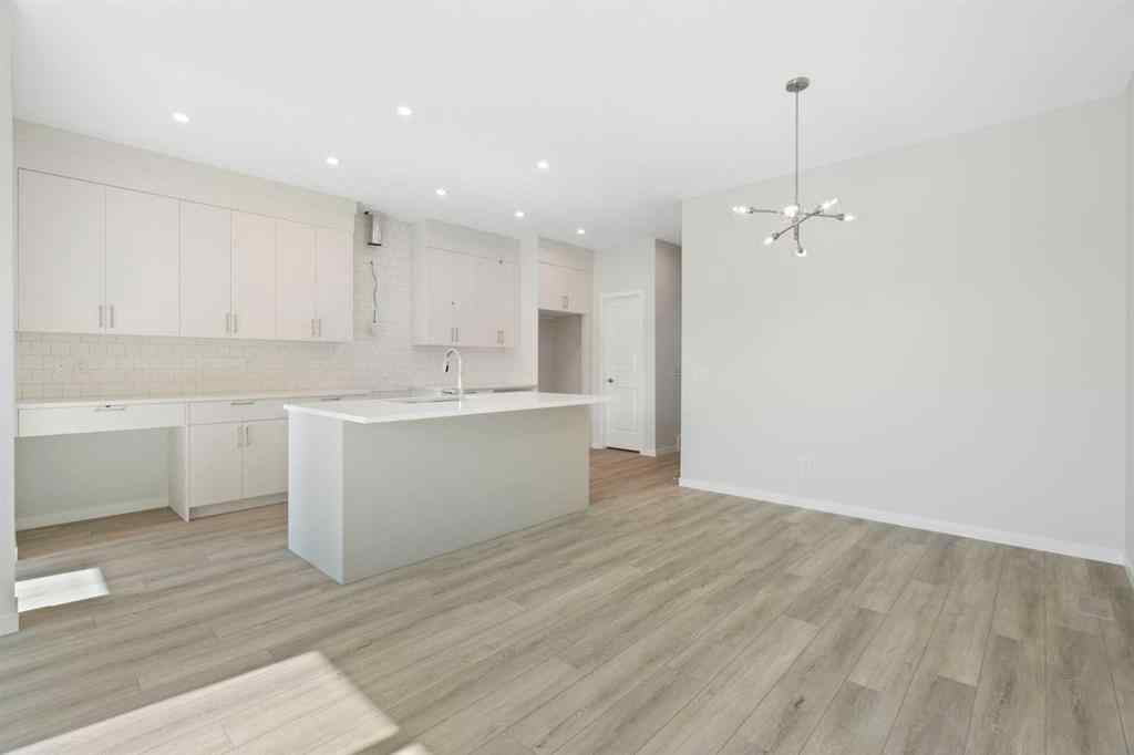 MLS® A2257737 - 34 Herron Common NE in Livingston Calgary, Residential