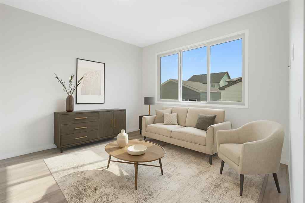 MLS® A2257737 - 34 Herron Common NE in Livingston Calgary, Residential
