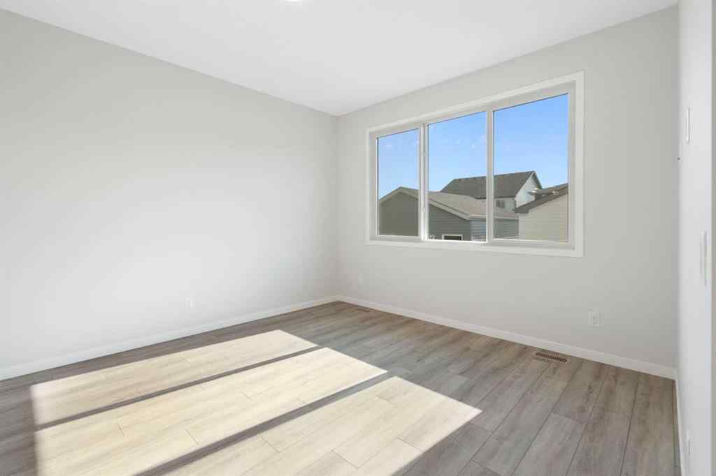 MLS® A2257737 - 34 Herron Common NE in Livingston Calgary, Residential