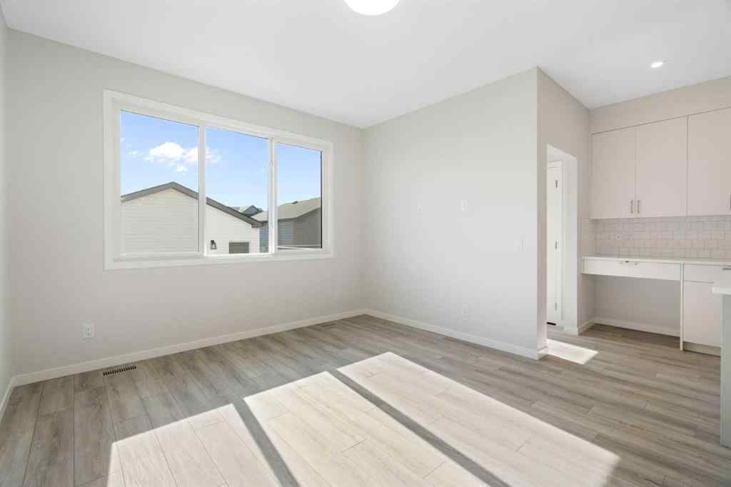 MLS® A2257737 - 34 Herron Common NE in Livingston Calgary, Residential