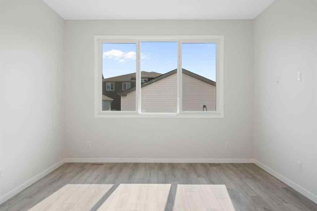 MLS® A2257737 - 34 Herron Common NE in Livingston Calgary, Residential