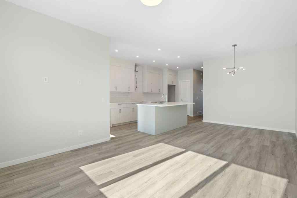 MLS® A2257737 - 34 Herron Common NE in Livingston Calgary, Residential
