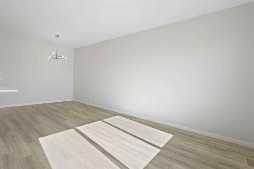MLS® A2257737 - 34 Herron Common NE in Livingston Calgary, Residential