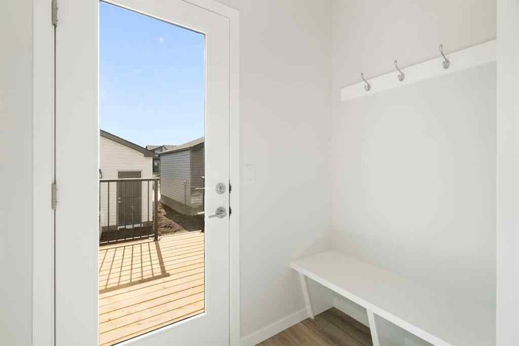 MLS® A2257737 - 34 Herron Common NE in Livingston Calgary, Residential