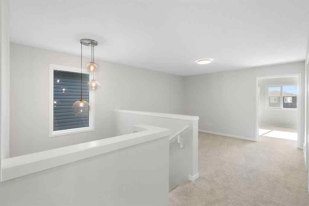 MLS® A2257737 - 34 Herron Common NE in Livingston Calgary, Residential
