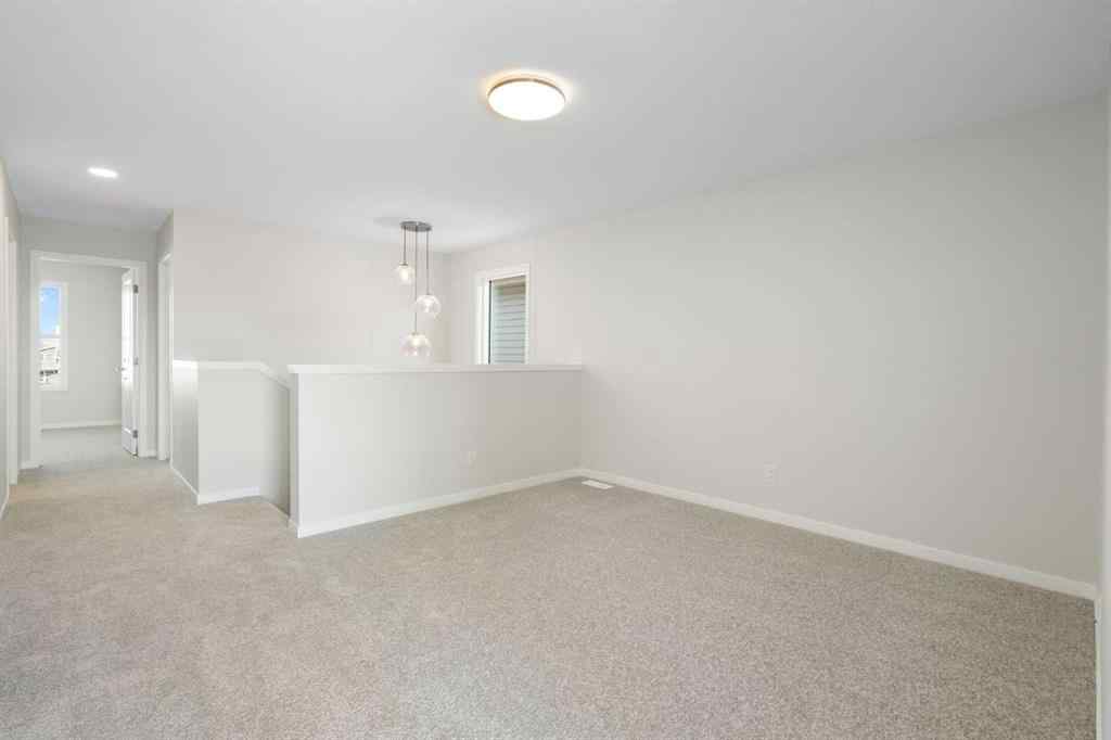MLS® A2257737 - 34 Herron Common NE in Livingston Calgary, Residential