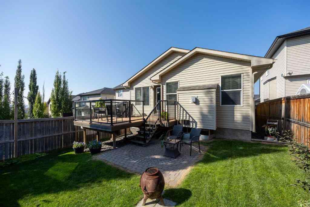MLS® A2257755 - 703 Tuscany Drive NW in Tuscany Calgary, Residential