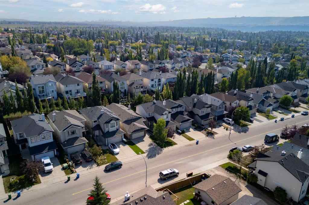 MLS® A2257755 - 703 Tuscany Drive NW in Tuscany Calgary, Residential