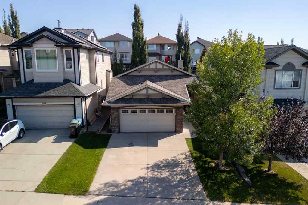 MLS® A2257755 - 703 Tuscany Drive NW in Tuscany Calgary, Residential