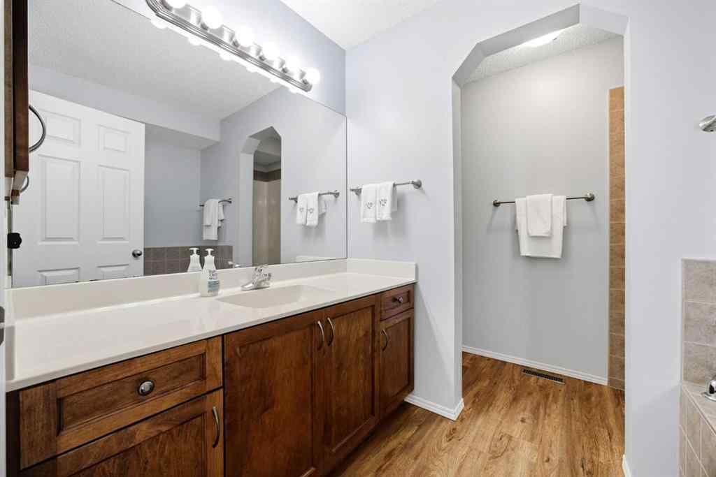 MLS® A2257755 - 703 Tuscany Drive NW in Tuscany Calgary, Residential