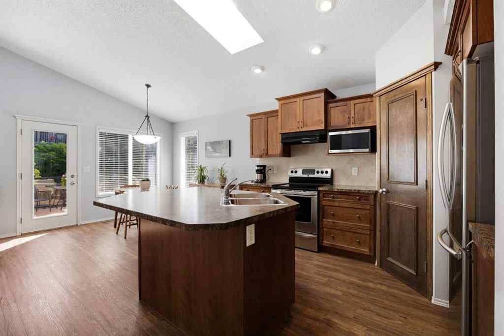 MLS® A2257755 - 703 Tuscany Drive NW in Tuscany Calgary, Residential