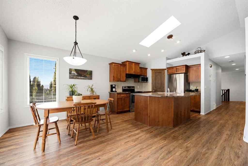 MLS® A2257755 - 703 Tuscany Drive NW in Tuscany Calgary, Residential