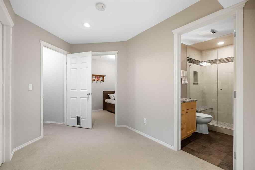 MLS® A2257755 - 703 Tuscany Drive NW in Tuscany Calgary, Residential