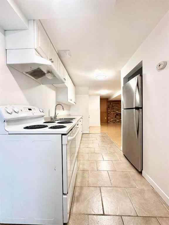 MLS® A2257762 - 703 130 Avenue SW in Canyon Meadows Calgary, Residential