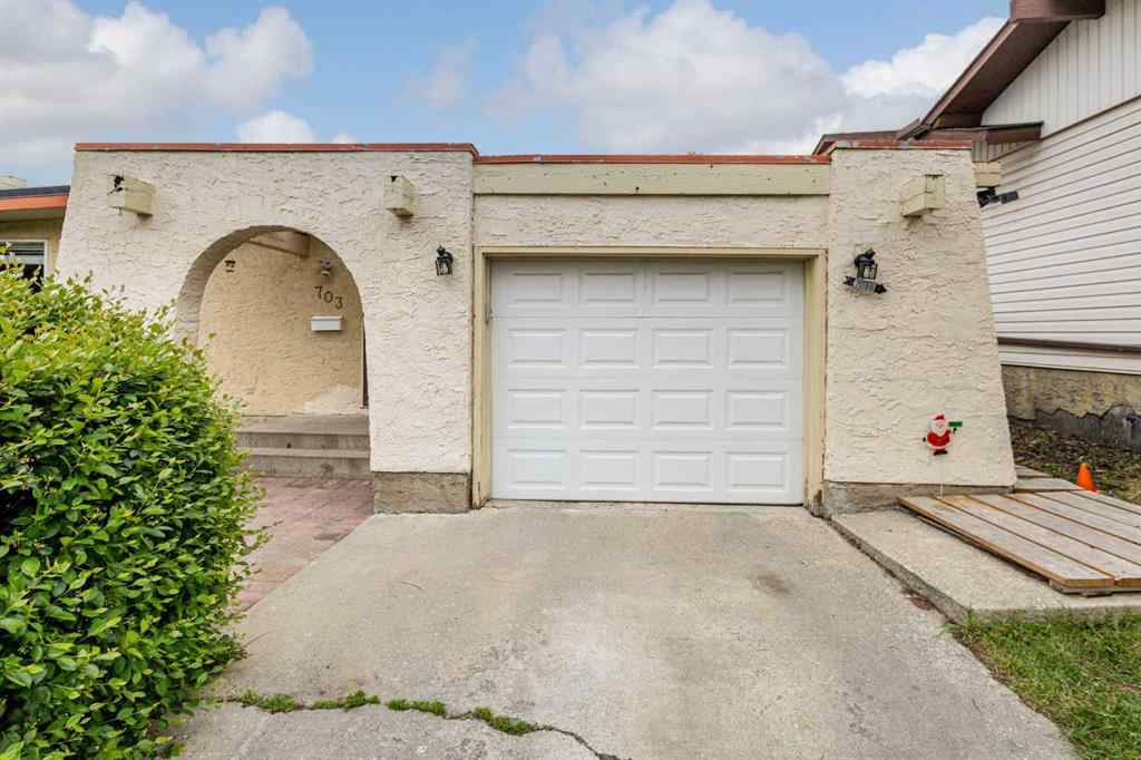 MLS® A2257762 - 703 130 Avenue SW in Canyon Meadows Calgary, Residential