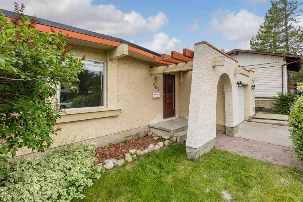 MLS® A2257762 - 703 130 Avenue SW in Canyon Meadows Calgary, Residential