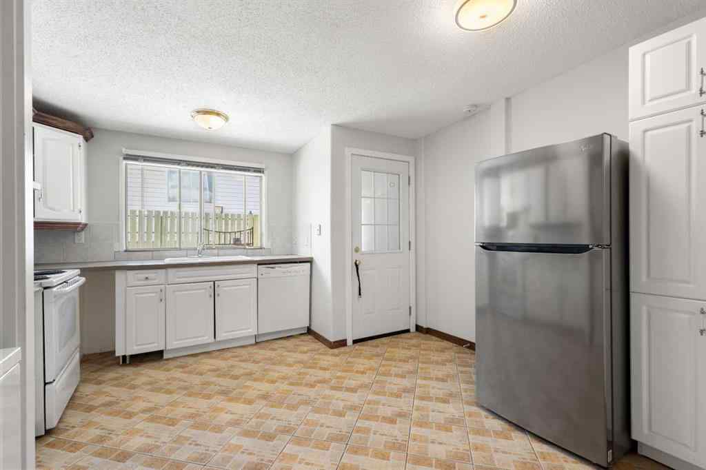 MLS® A2257762 - 703 130 Avenue SW in Canyon Meadows Calgary, Residential