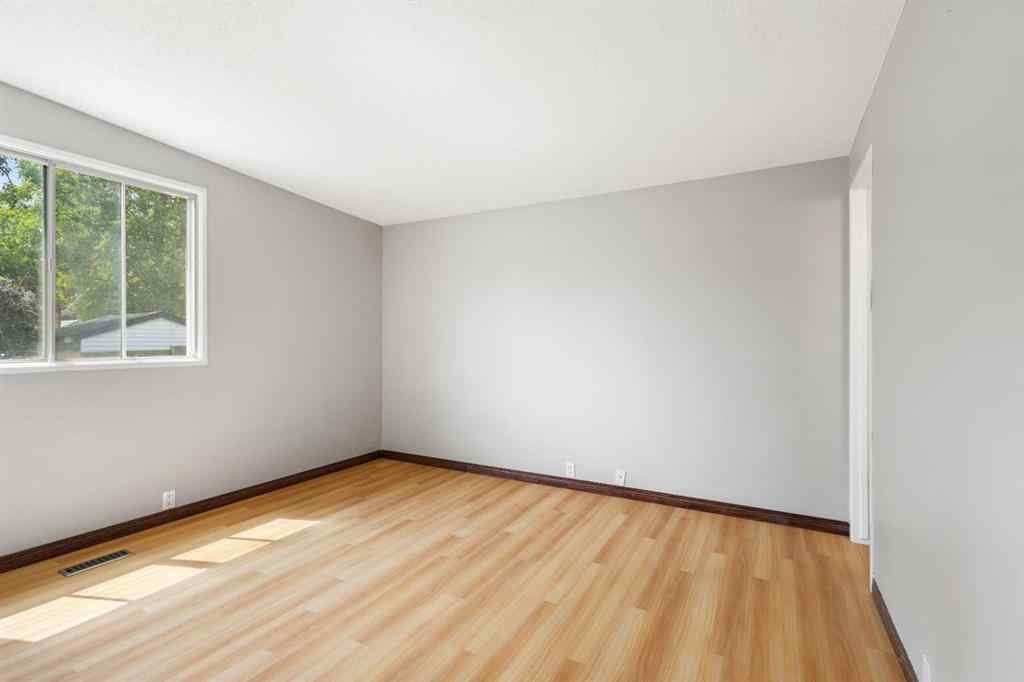 MLS® A2257762 - 703 130 Avenue SW in Canyon Meadows Calgary, Residential