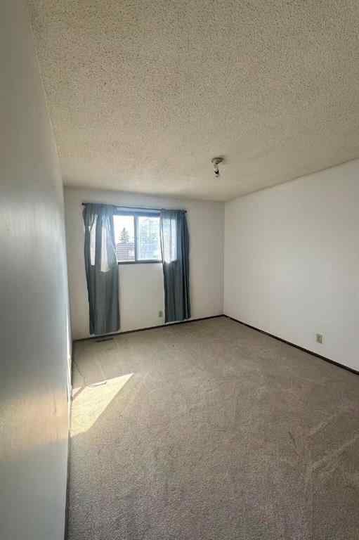 MLS® A2257764 - Unit #3 11 Blackthorn Bay NE in Thorncliffe Calgary, Residential