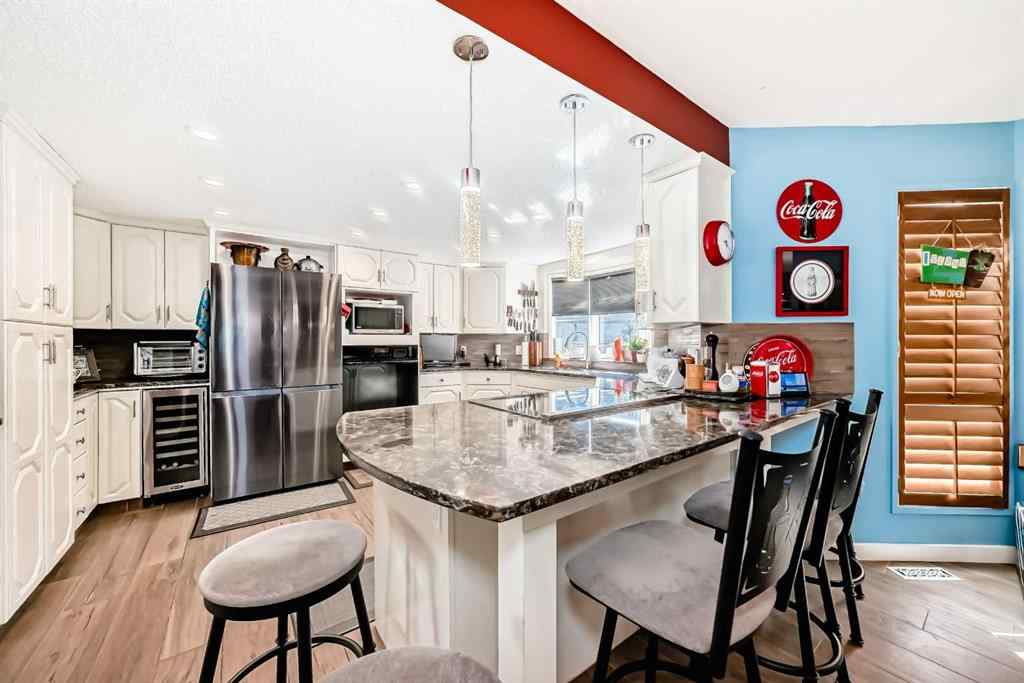 MLS® A2257774 - 135 Canter Place SW in Canyon Meadows Calgary, Residential