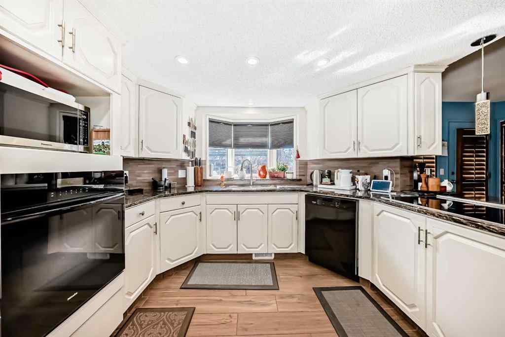 MLS® A2257774 - 135 Canter Place SW in Canyon Meadows Calgary, Residential