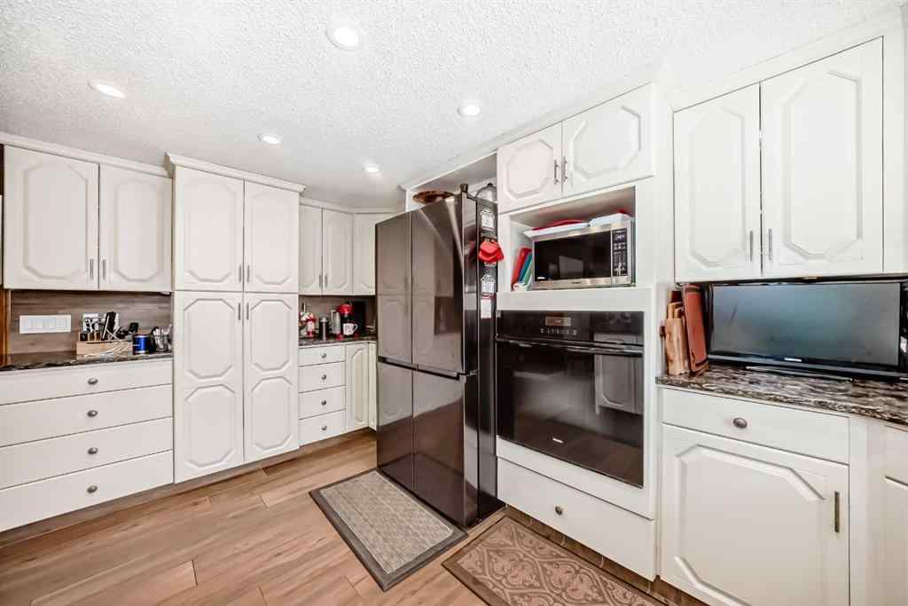 MLS® A2257774 - 135 Canter Place SW in Canyon Meadows Calgary, Residential