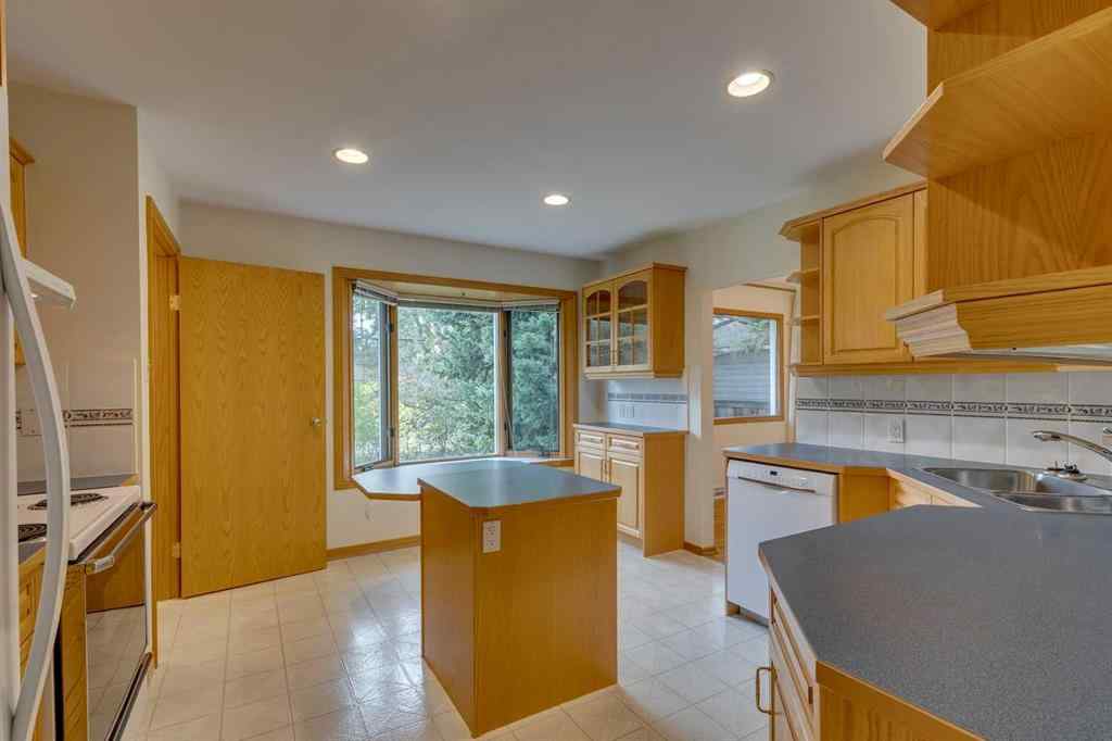 MLS® A2257795 - 104 Haysboro Crescent SW in Haysboro Calgary, Residential