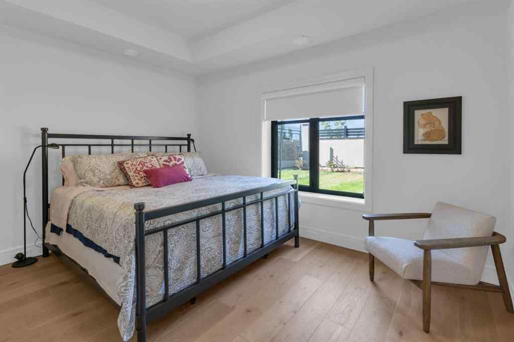 MLS® A2257815 - 103 Elveden Court SW in Springbank Hill Calgary, Residential