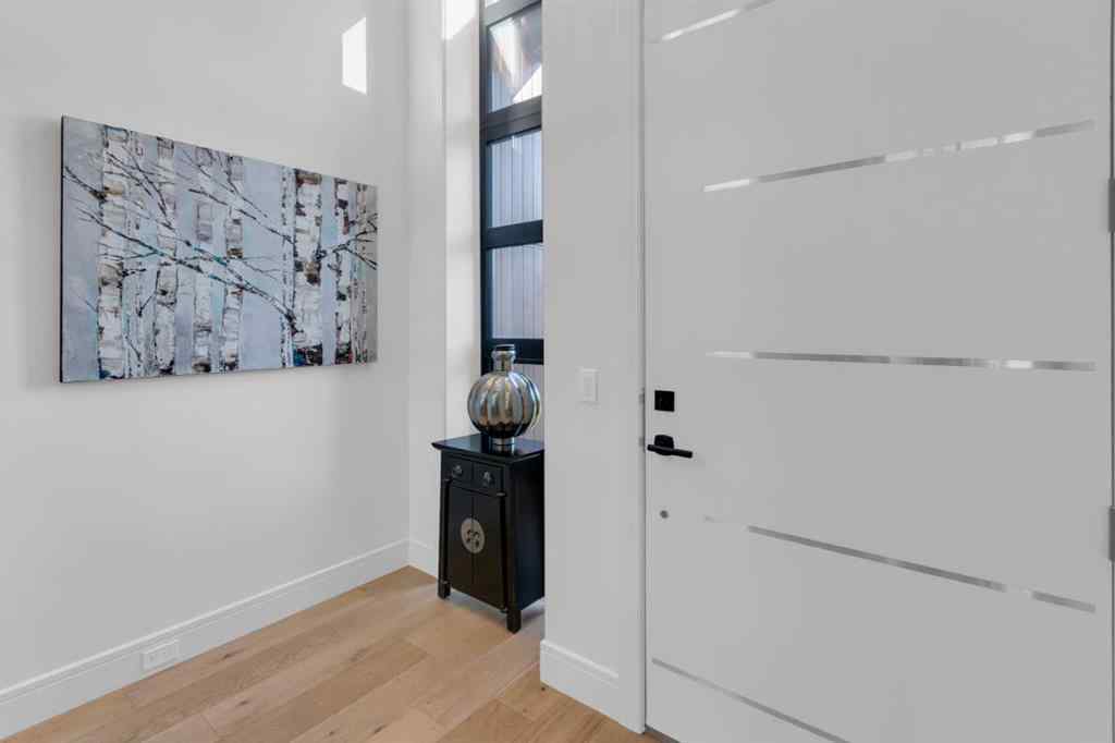 MLS® A2257815 - 103 Elveden Court SW in Springbank Hill Calgary, Residential