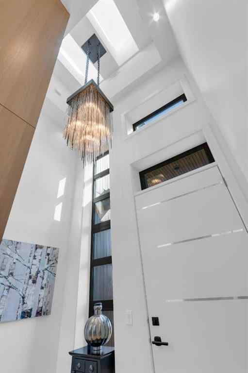 MLS® A2257815 - 103 Elveden Court SW in Springbank Hill Calgary, Residential