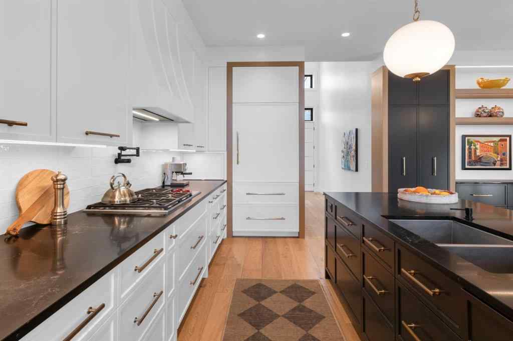 MLS® A2257815 - 103 Elveden Court SW in Springbank Hill Calgary, Residential