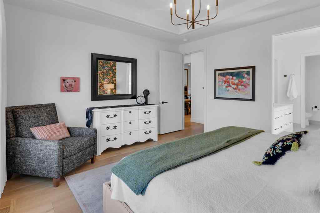 MLS® A2257815 - 103 Elveden Court SW in Springbank Hill Calgary, Residential