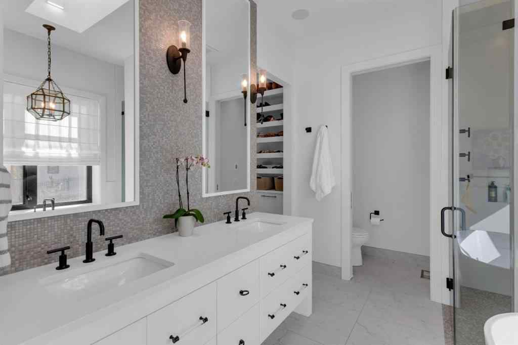 MLS® A2257815 - 103 Elveden Court SW in Springbank Hill Calgary, Residential
