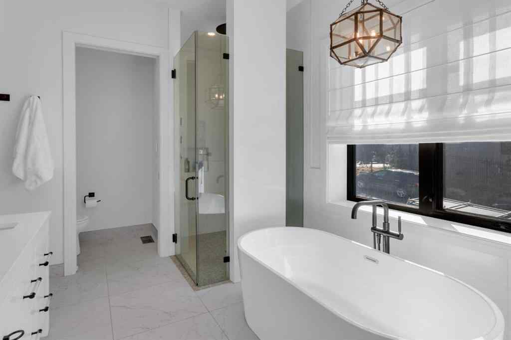 MLS® A2257815 - 103 Elveden Court SW in Springbank Hill Calgary, Residential