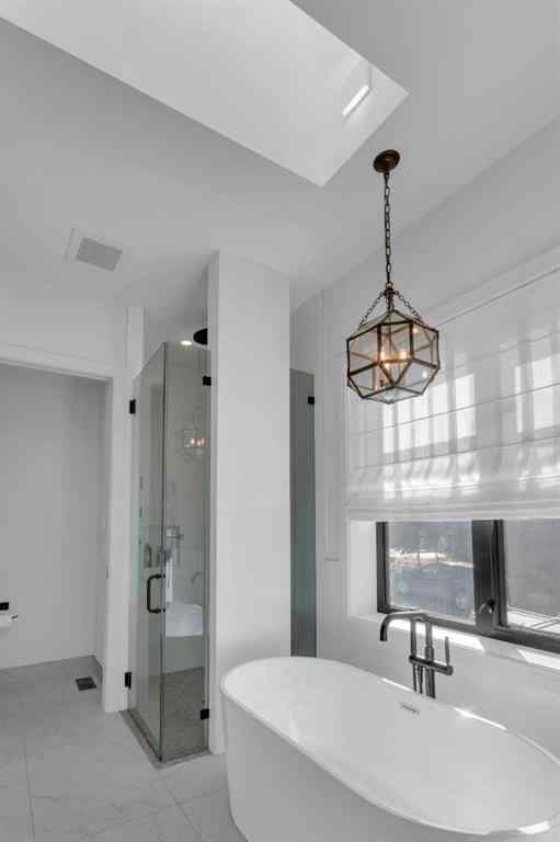 MLS® A2257815 - 103 Elveden Court SW in Springbank Hill Calgary, Residential
