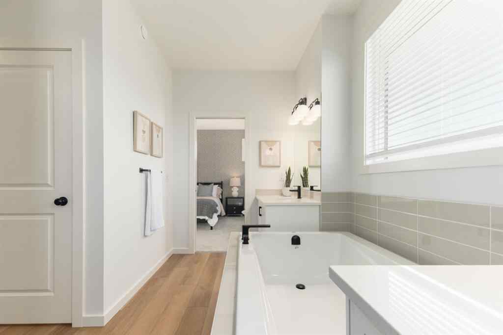 MLS® A2257842 - 80 Creekside Path SW in Pine Creek Calgary, Residential