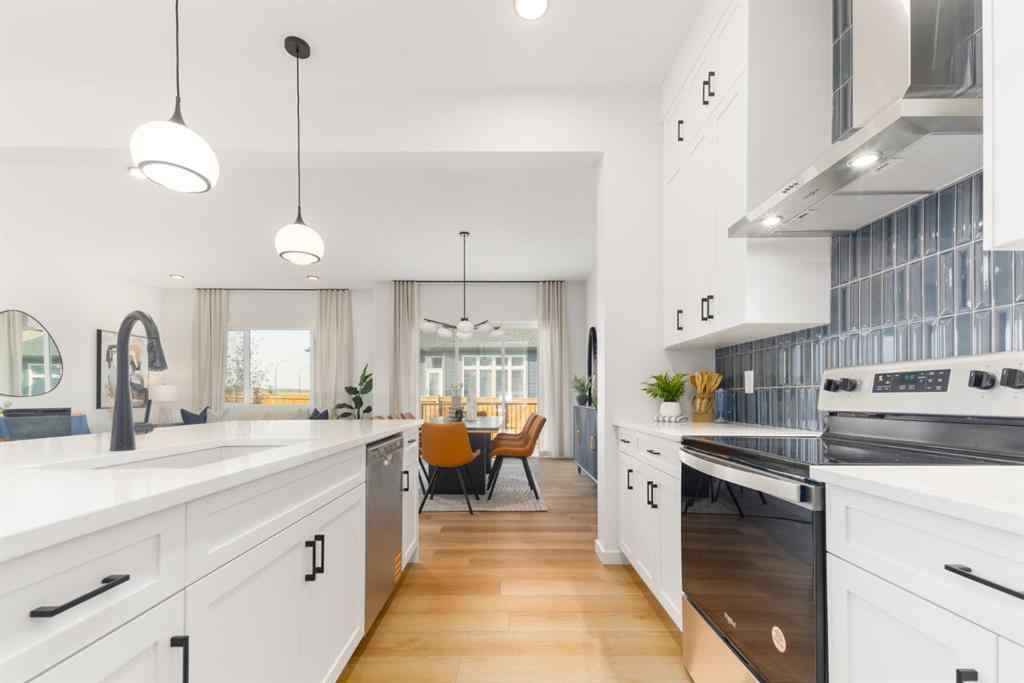 MLS® A2257842 - 80 Creekside Path SW in Pine Creek Calgary, Residential